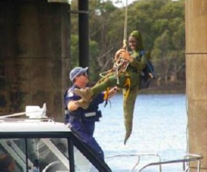 Protester dressed as gecko blocks coal trains
