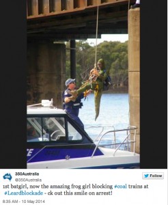 Protester dressed as gecko blocks coal trains