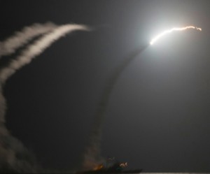 Gold up on Syria bombing, weaker dollar