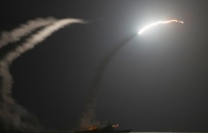 Gold up on Syria bombing, weaker dollar