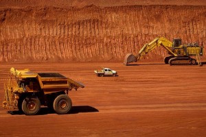 Rio Tinto digging up more iron ore despite slumping prices