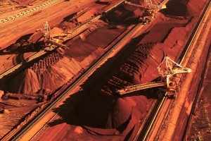 BHP Billiton beats iron ore guidance, takes copper write-downs