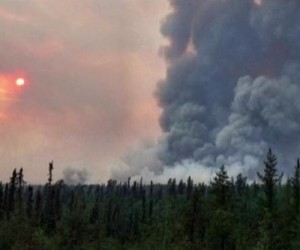 Wild fires in Western Canada force miners to halt operations, shipments