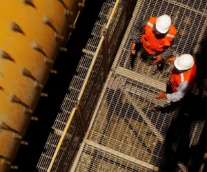 Glencore hit by $790 million writedown, cuts spending