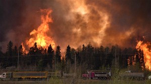 Canadian oil sands camps evacuated as wildfire shifts north