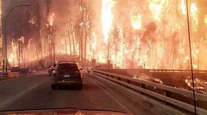 Wildfire hitting Canada’s oil sands heart gets closer to major plants