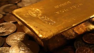 Gold bar with coins.