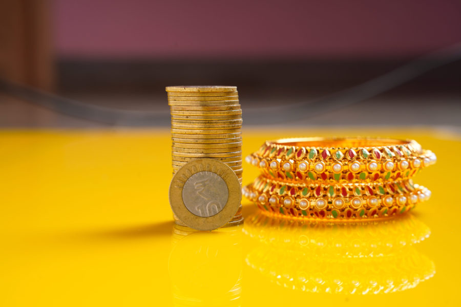 India gold demand ticks up as prices slip; China premiums ease